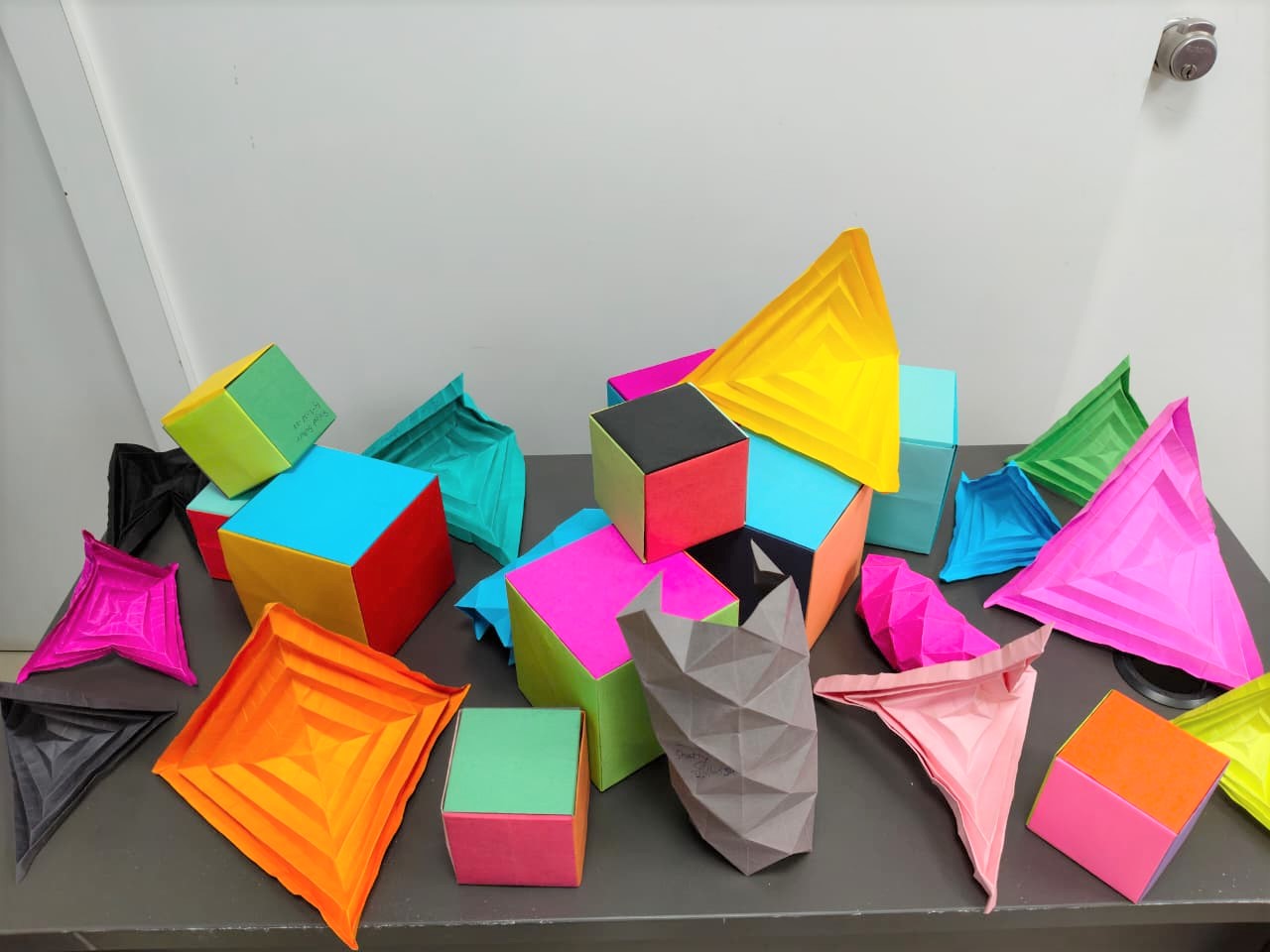 Student origami work from the induction program